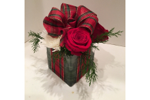Its a flower arrangement that looks like a gift! holidayarr.jpg