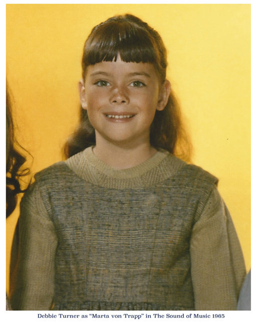 Debbie as Marta